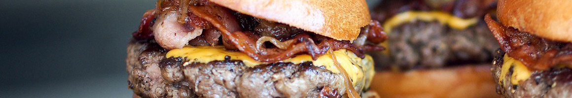 Eating Burger Fast Food at Oh My Burger restaurant in Gardena, CA.